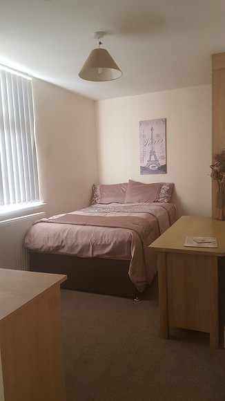 Room 2 - £85  inc all bills. Double storage bed.  quality fitted wardrobe, desk & vanity unit.