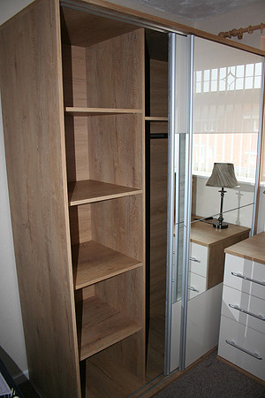Plenty of storage and sliding mirrored wardrobe.