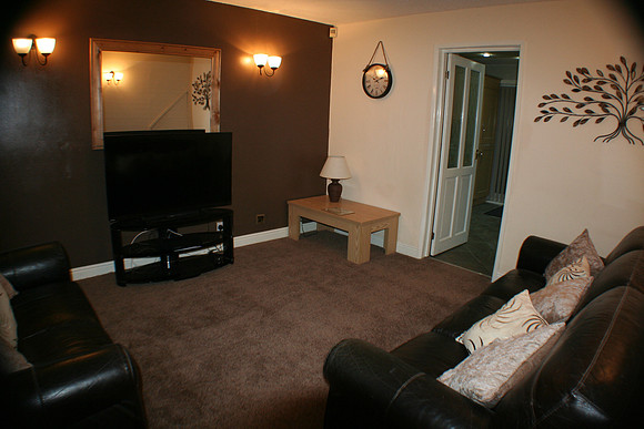 Lounge. Large flat screen TV.